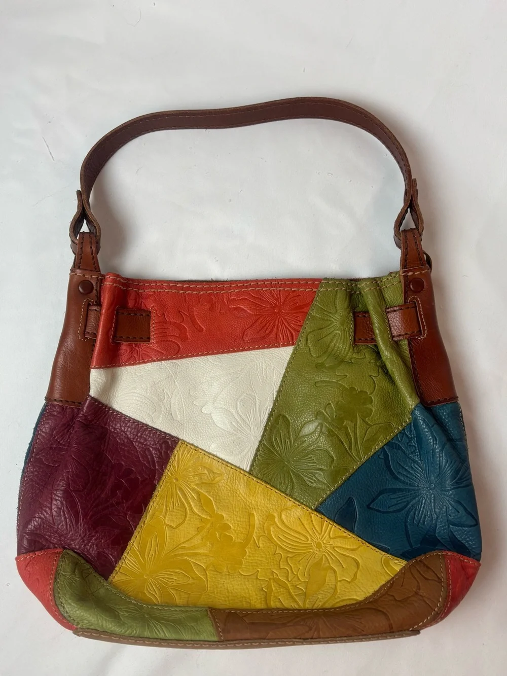 Fossil tooled leather